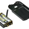Battery compartment with three triple A batteries and the cover to the side
