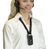 Pretty, young, woman with long blond hair pulled into a ponytail, wearing a white, long-sleeved button-down dress shirt, and over-the-head headset with a mic and a ListenTALK unit clipped onto a lanyard hanging around her neck