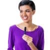 Woman holding the hand held microphone up to her mouth