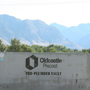 Oldcastle precast concrete vault outside in front of a mountain