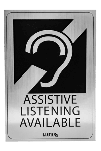 Silver plaque that reads, "Assistive Listening Available"