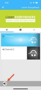 View of the Listen EVERYWHERE app showing channels to select with an arrow pointing to the loudspeaker toggle icon in the bottom left-hand corner of the app.