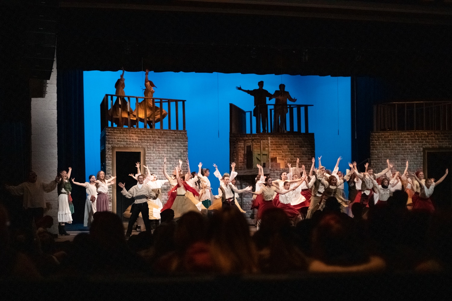 Fremont High School students on stage during their production of Anastasia. Hayden Reeve is performing on the left side of the stage.