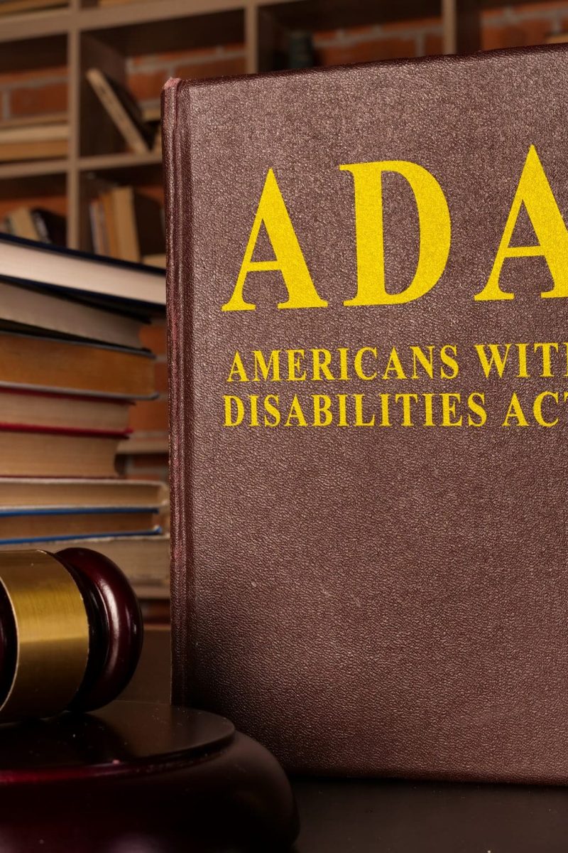 Gavel and Americans with Disabilities Act ADA book with documents. Gavel and Americans with Disabilities Act ADA book with documents.